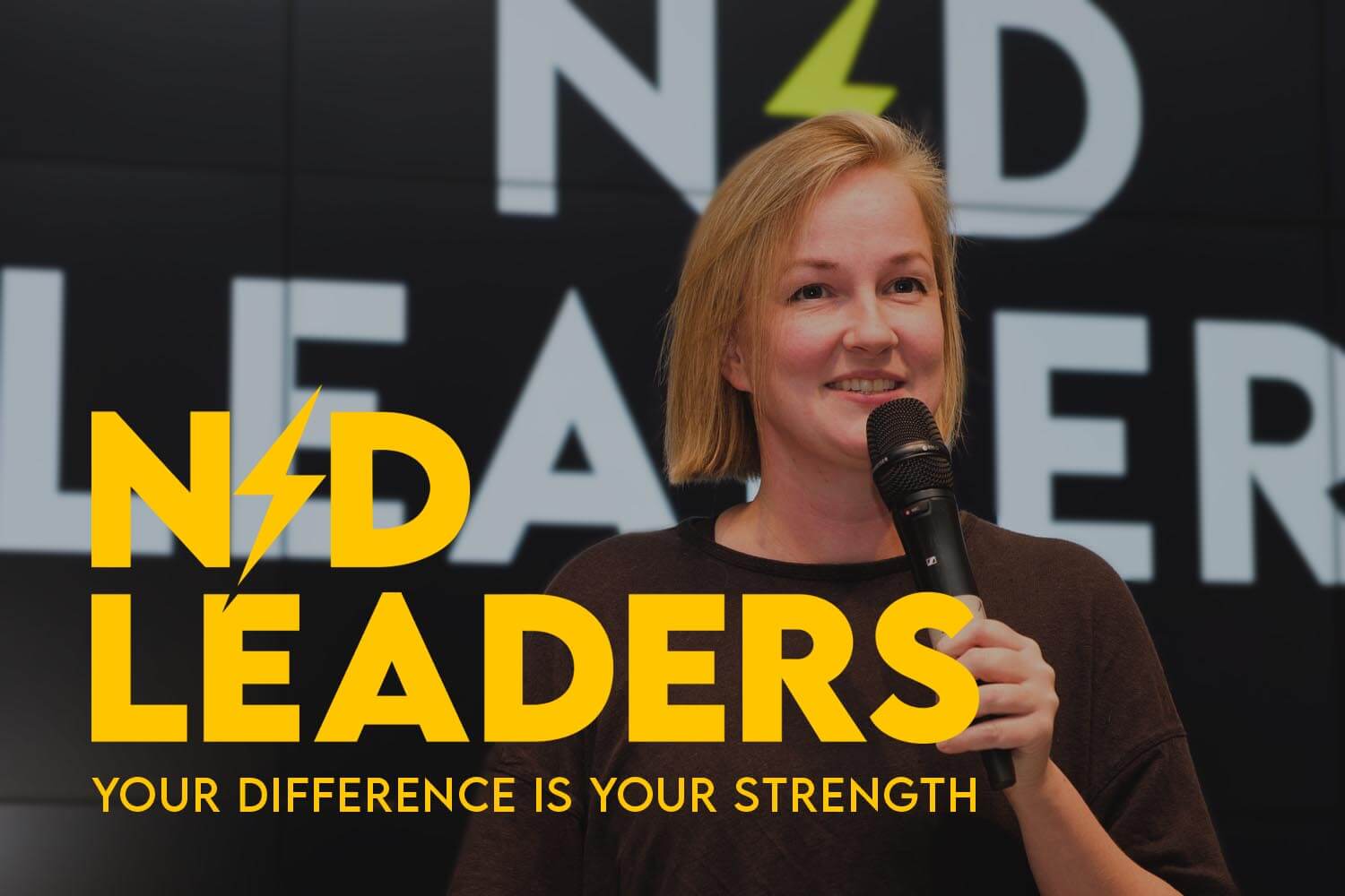 ND Leaders event post featuring a speaker smiling while holding a microphone, with large yellow text 'ND Leaders' and the tagline 'Your Difference is Your Strength,' reinforcing the event’s message of celebrating neurodiversity.